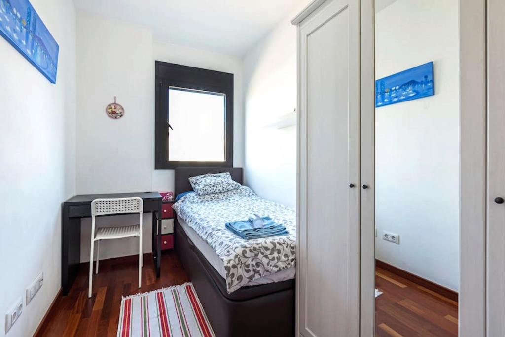 Posteľ alebo postele v izbe v ubytovaní Jie Apartment