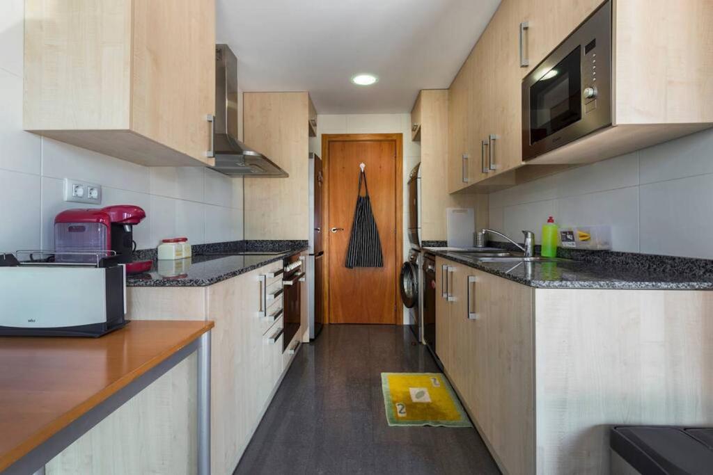 Kuchyňa alebo kuchynka v ubytovaní Jie Apartment