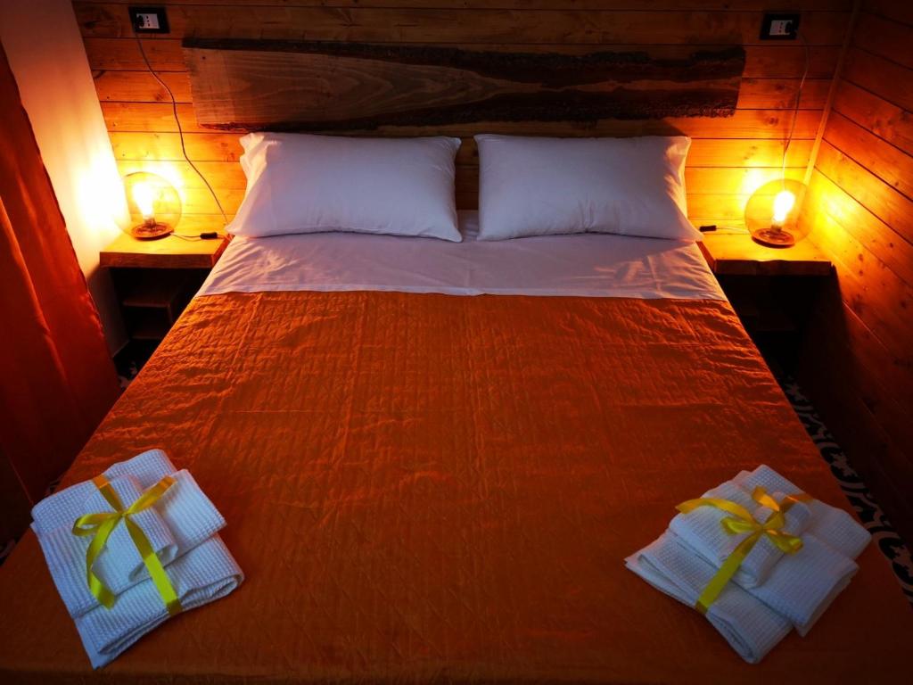 Кровать или кровати в номере Trapani Destinations b&b