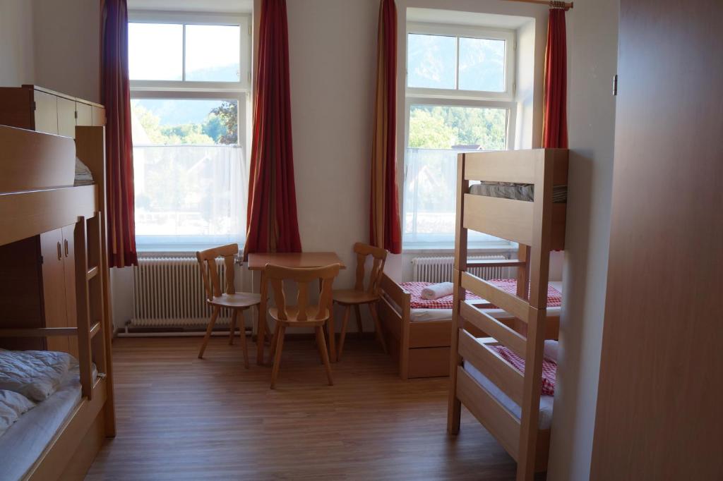 Postel nebo postele na pokoji v ubytování Luise Wehrenfennig & Haus EvA