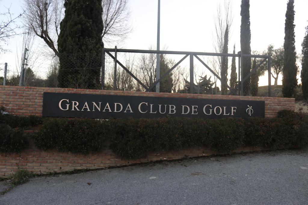 a sign for the grandada club de golf at impulsogolf in Las Gabias