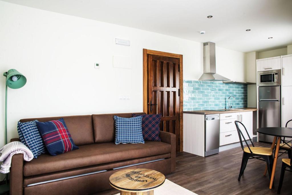 Kuchyň nebo kuchyňský kout v ubytování Apartamentos Estela de Altamira