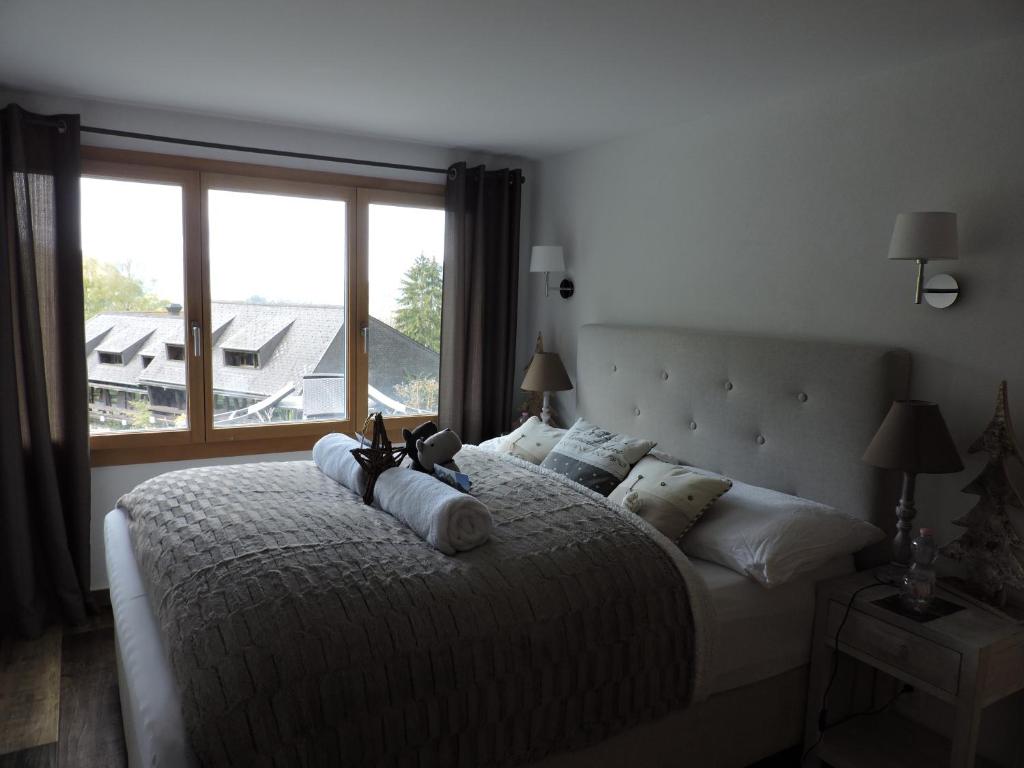 Postel nebo postele na pokoji v ubytování Chalet L'Escapade