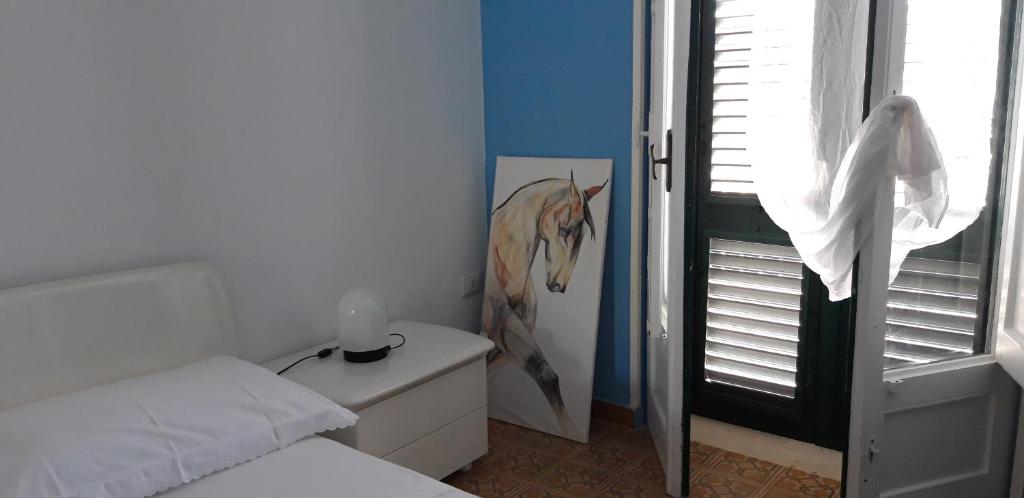 Postel nebo postele na pokoji v ubytování Le Calle