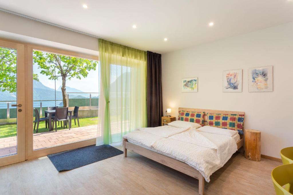 Postel nebo postele na pokoji v ubytování Lodge Le Soleil