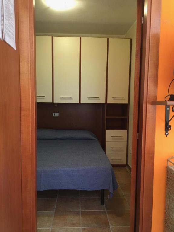 Posteľ alebo postele v izbe v ubytovaní Villa Carla
