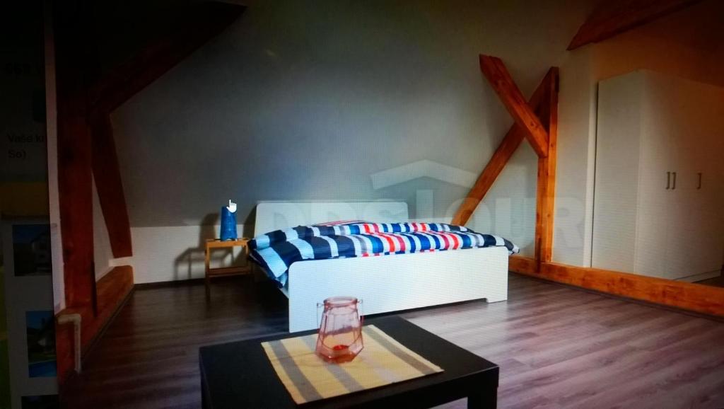 Postel nebo postele na pokoji v ubytování chata pod Slunečnou