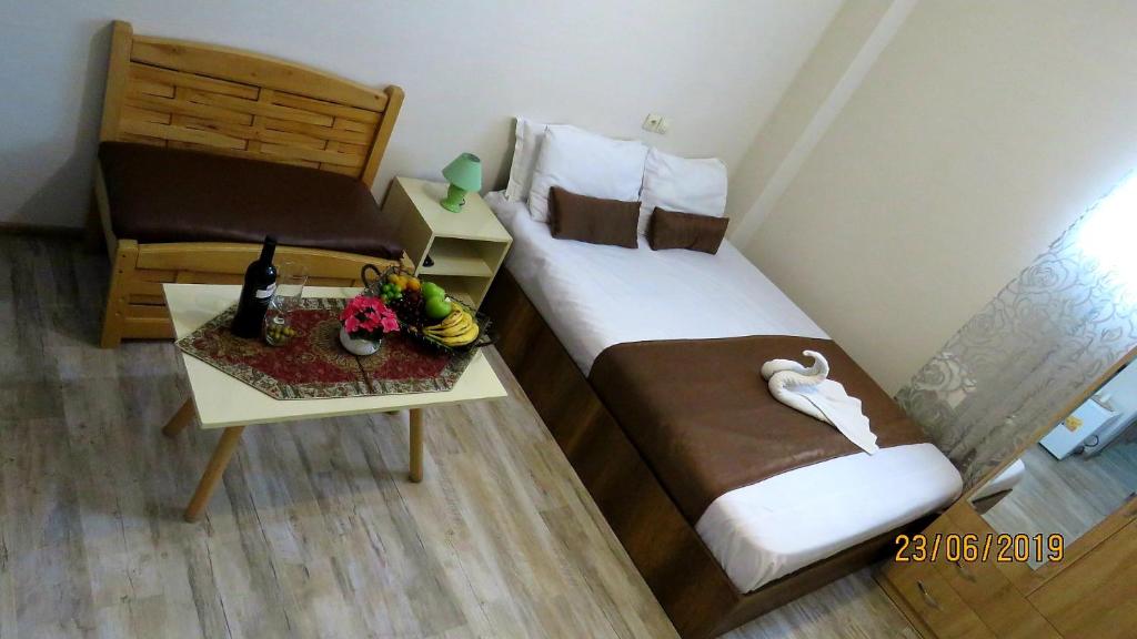 Postel nebo postele na pokoji v ubytování Atlas Hotel
