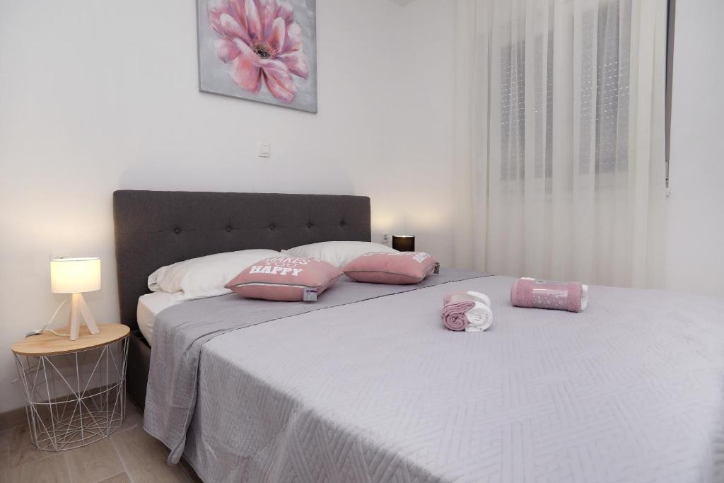Postel nebo postele na pokoji v ubytování Apartment Little Marijeta