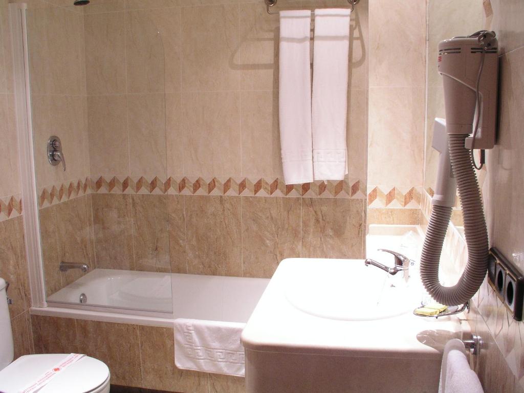 Koupelna v ubytování Hotel Oasis Familiar
