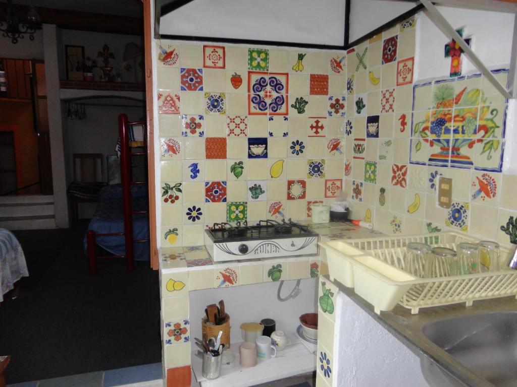 Kuchyň nebo kuchyňský kout v ubytování Casa Bertha