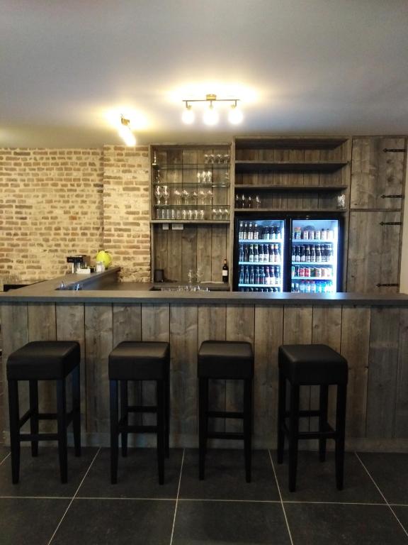 Lounge nebo bar v ubytování B&B De Oude Winning