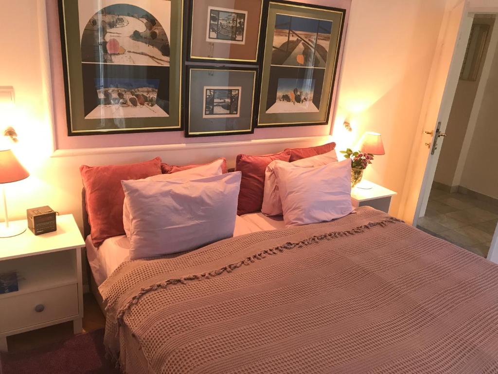 Ένα ή περισσότερα κρεβάτια σε δωμάτιο στο APARTMENT AMBLI HOUSE