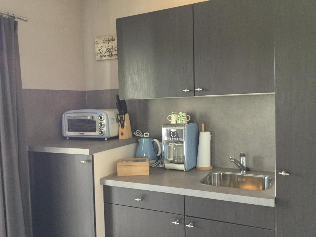 Kuchyň nebo kuchyňský kout v ubytování zu Jeddelohs Bungalows & Apartments -Adult friendly