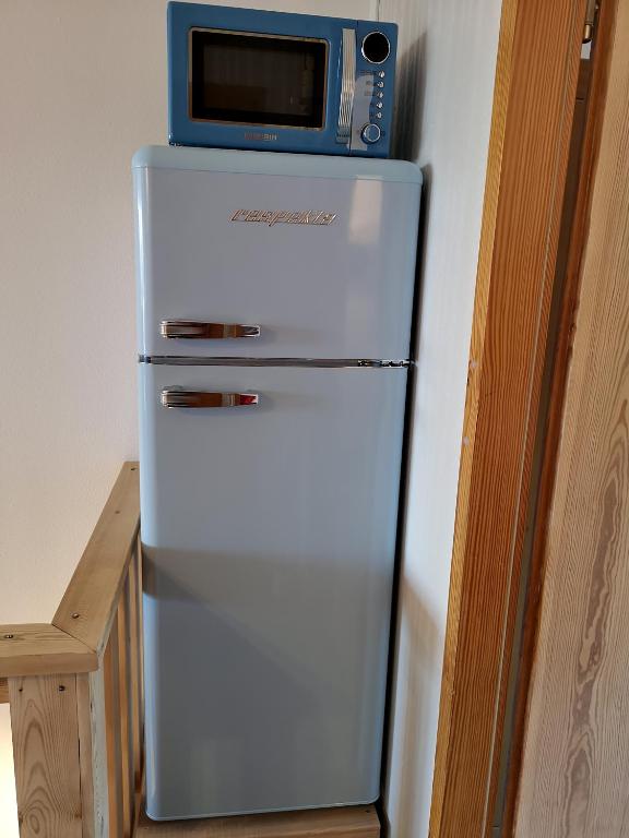 Kuchyň nebo kuchyňský kout v ubytování Waldwipfel-Appartement