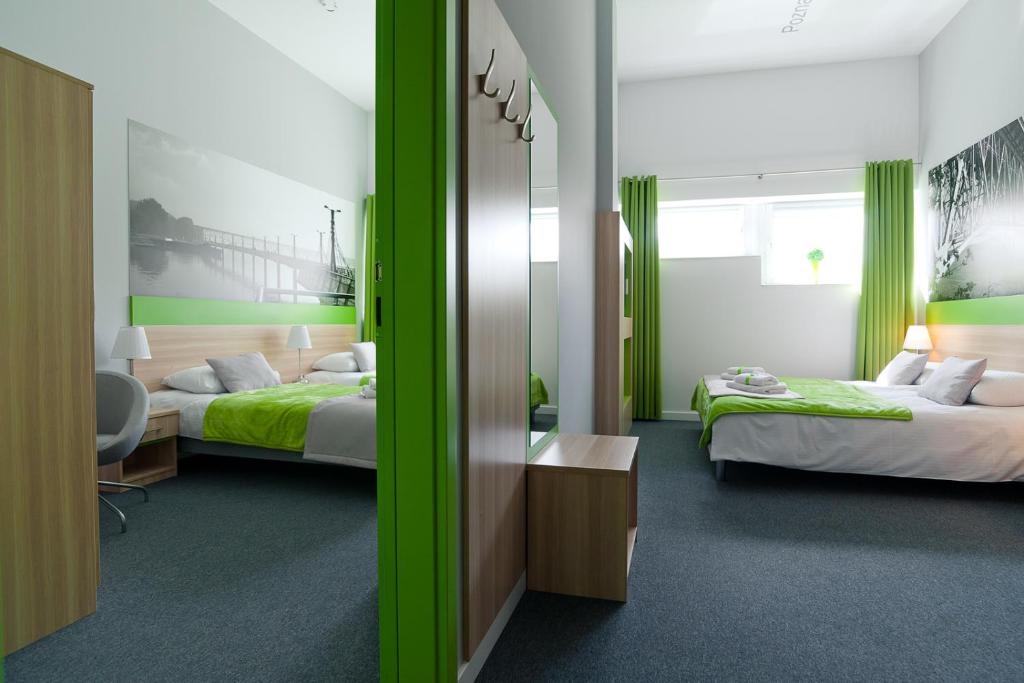 Postel nebo postele na pokoji v ubytování Green Hotel Płock