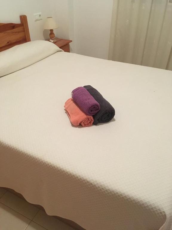 Postel nebo postele na pokoji v ubytování Marcel Riumar Apartamento