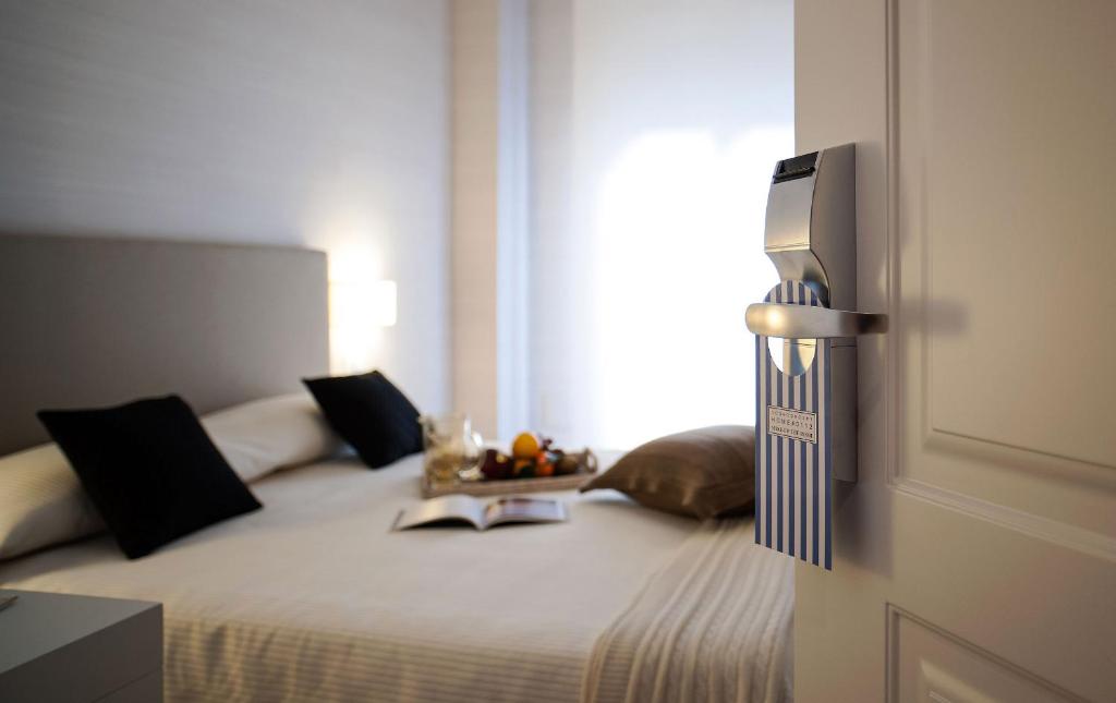 Postel nebo postele na pokoji v ubytování B&B Blanc