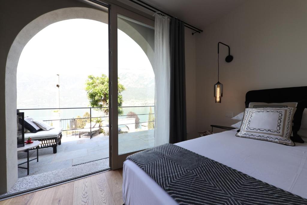Posteľ alebo postele v izbe v ubytovaní Villa Mojana Bellagio