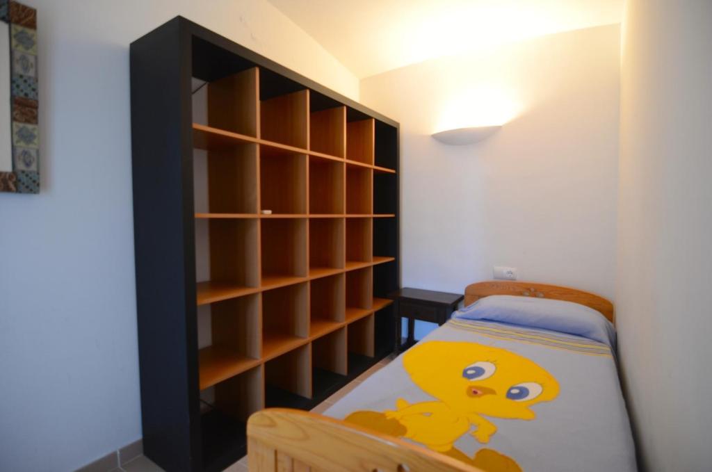Postel nebo postele na pokoji v ubytování Plaça dels Pous 14