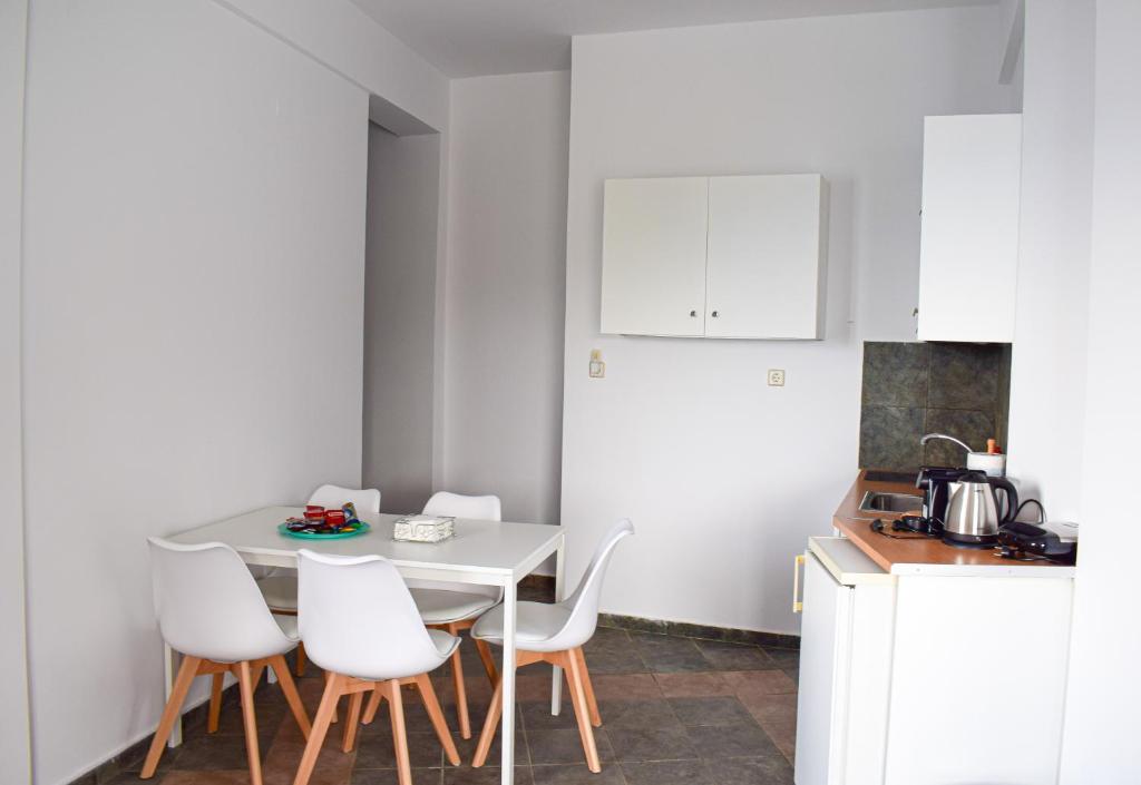 A kitchen or kitchenette at Muses seaside Villas
