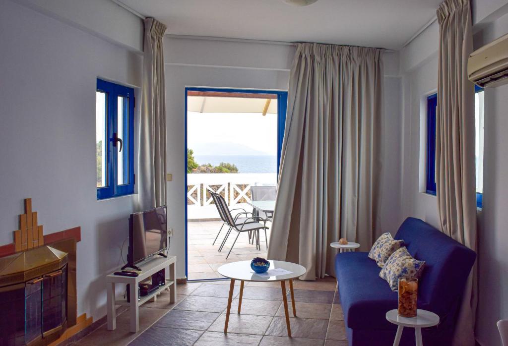 A seating area at Muses seaside Villas