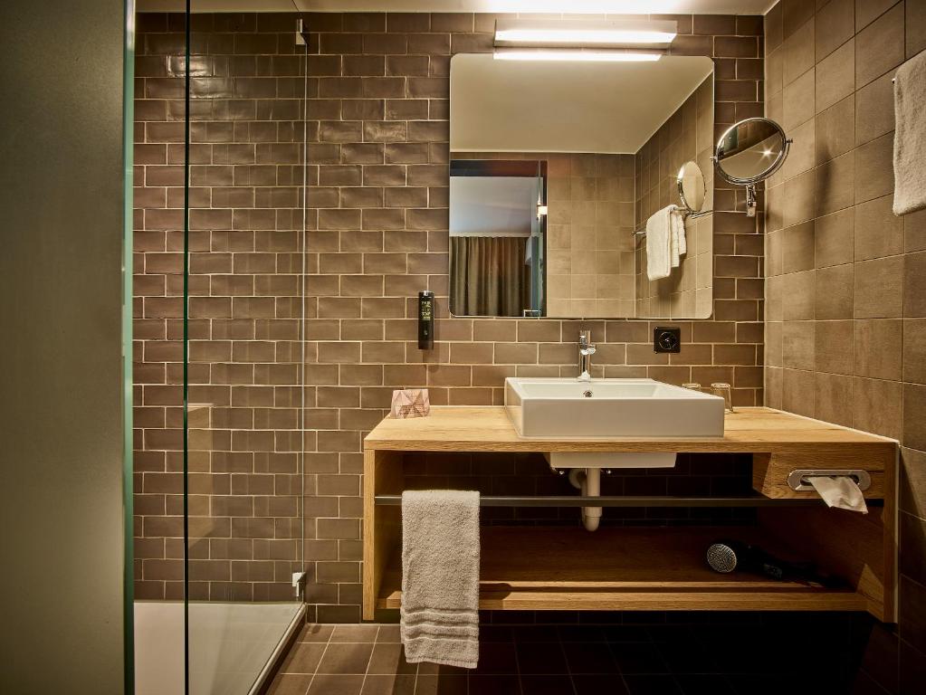 Un baño de Baxter Hotel