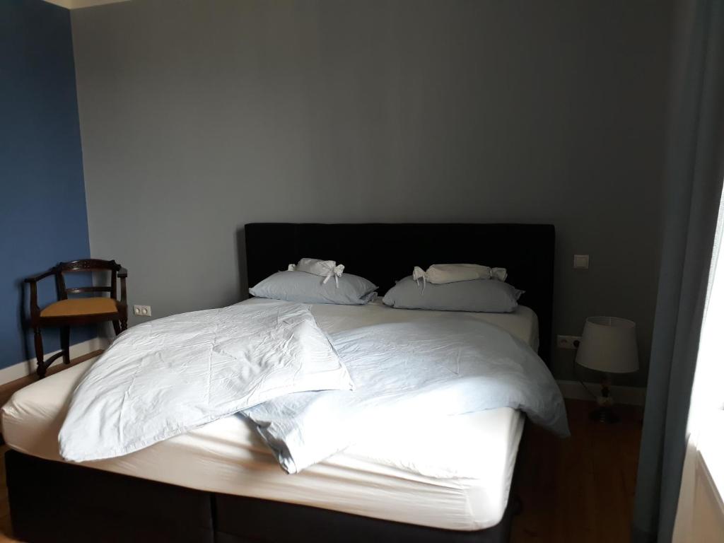 Postel nebo postele na pokoji v ubytování Emmas