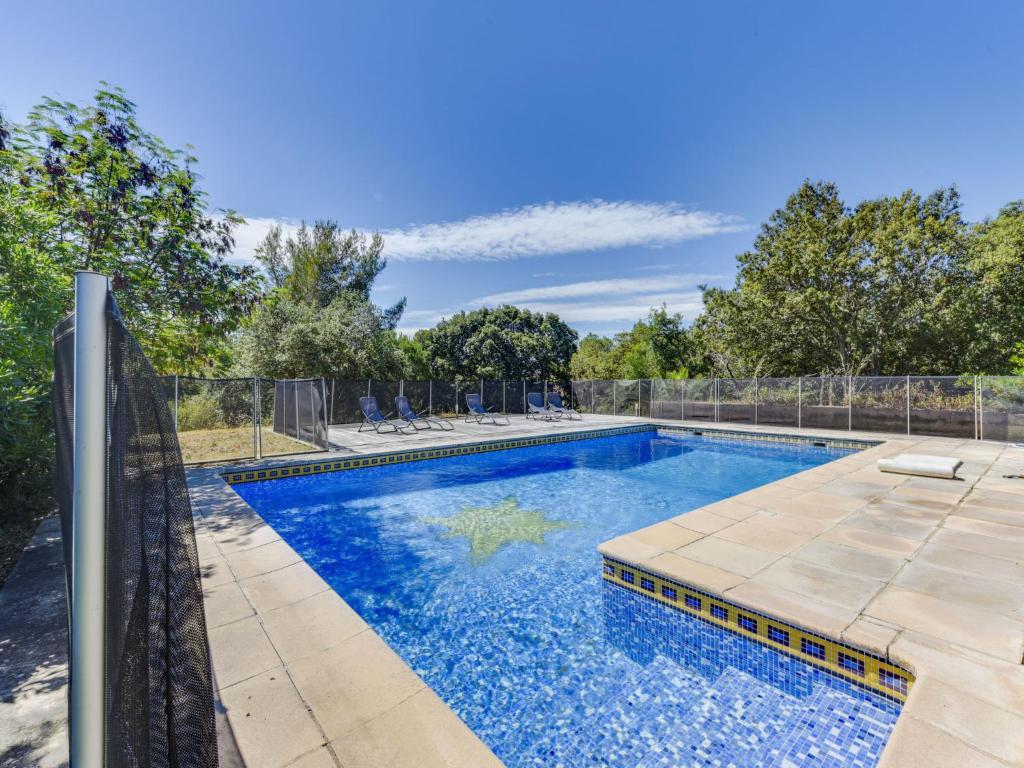 une piscine entourée d'une clôture dans l'établissement Villa Cassou by Interhome, à La Croix-Valmer