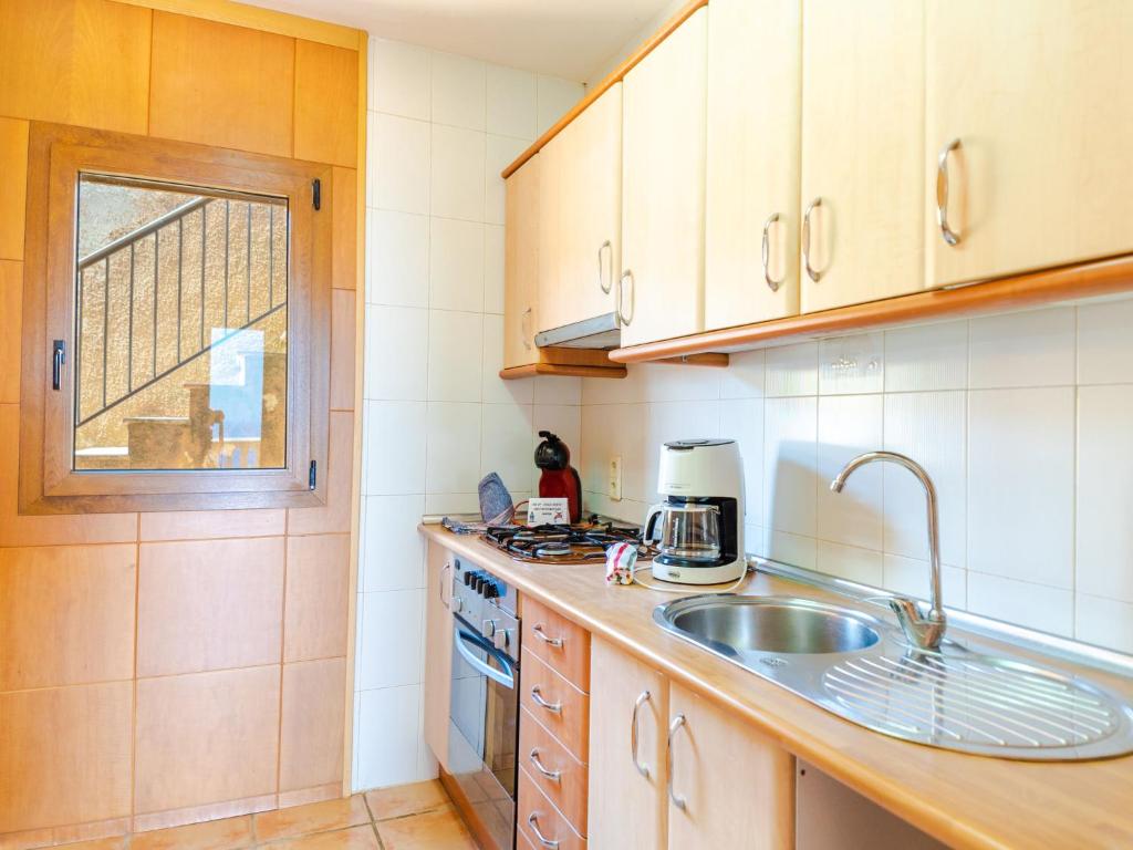 Kuchyň nebo kuchyňský kout v ubytování Villa Cala Torta Na Lluny by Interhome