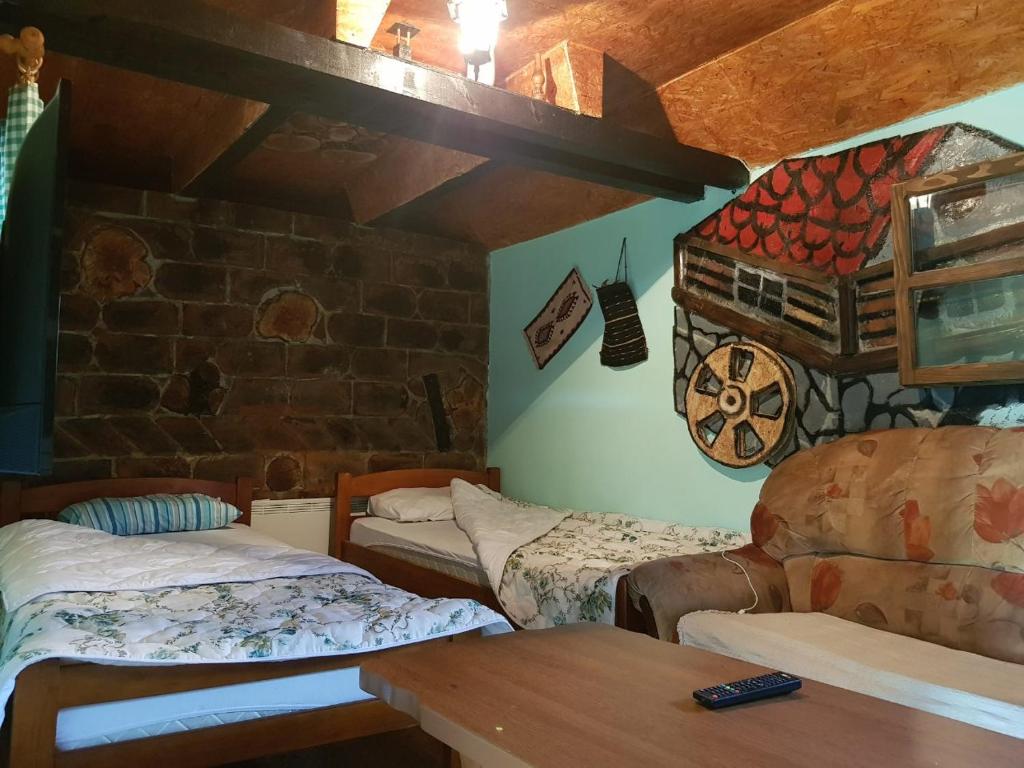 Krevet ili kreveti u jedinici u okviru objekta Seoski turizam-Drinski vajati Dado