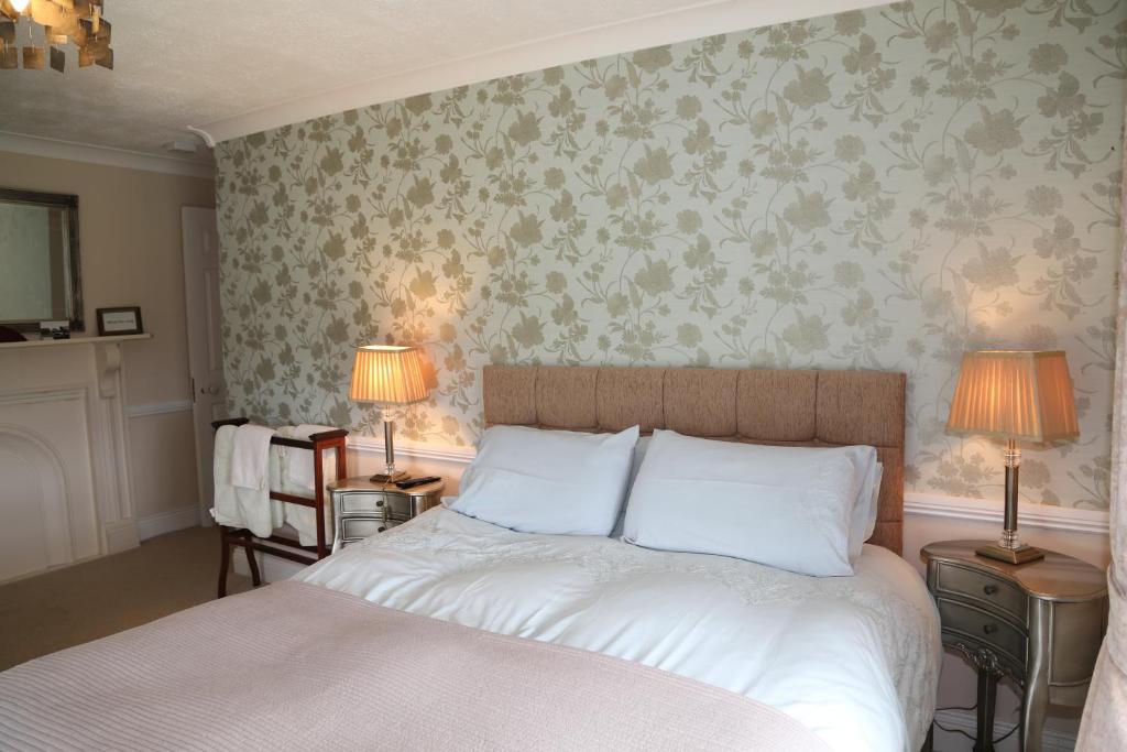 Postel nebo postele na pokoji v ubytování Glebe House