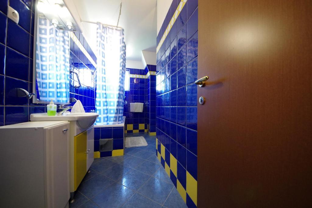 Kúpeľňa v ubytovaní Apartments Villa Hraste Hvar