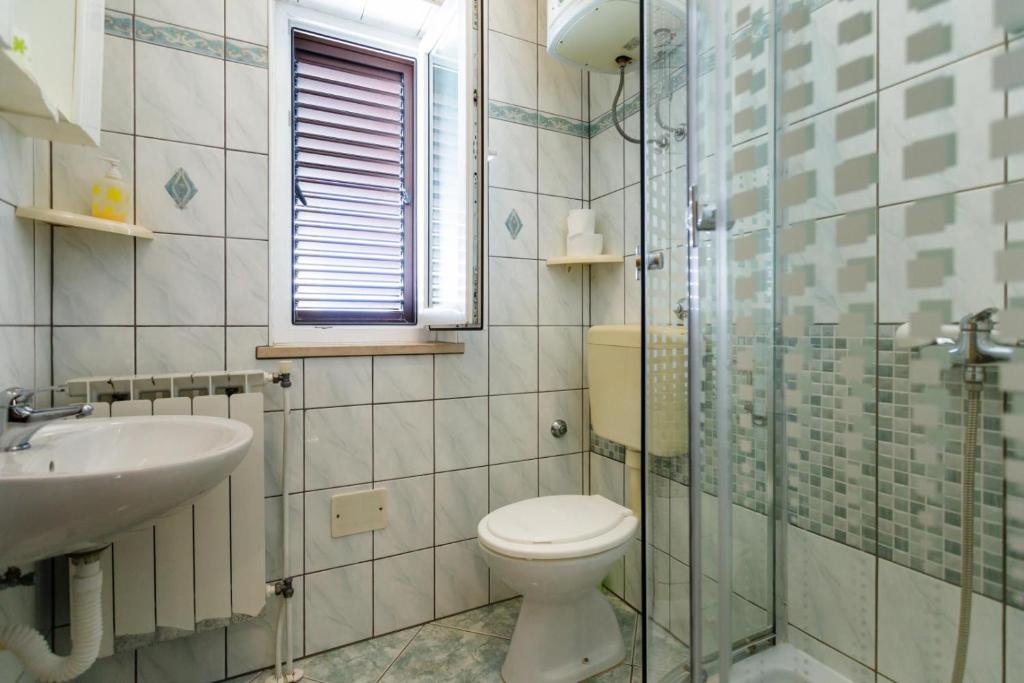 Koupelna v ubytování Rooms Mimi