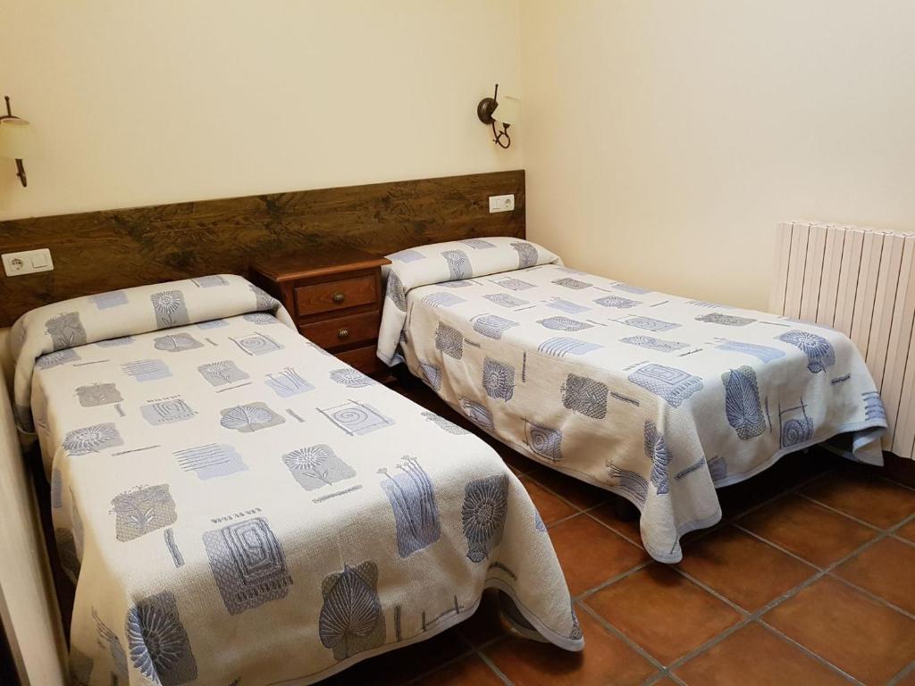 Postel nebo postele na pokoji v ubytování Apartamentos Casa Alcaire