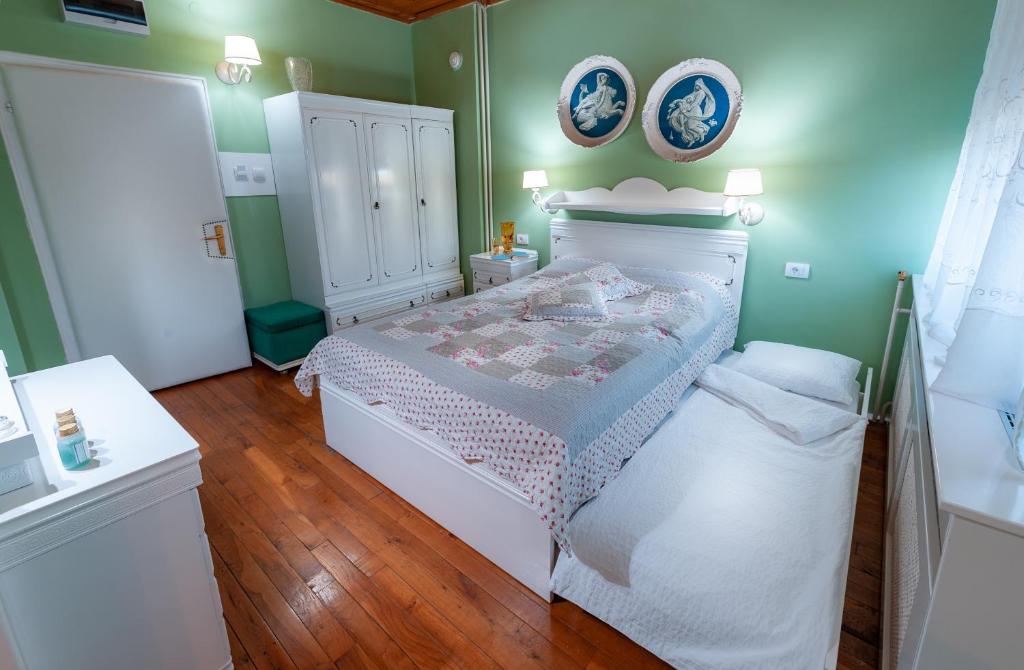 Postel nebo postele na pokoji v ubytování Kuća Jankovića