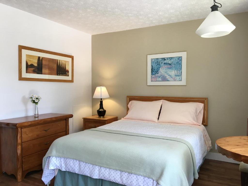 Postel nebo postele na pokoji v ubytování Motel le Sabre