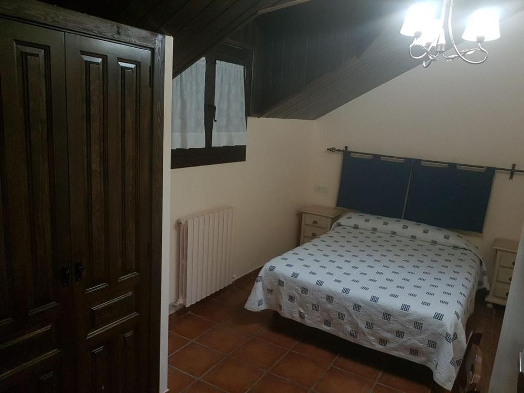 Postel nebo postele na pokoji v ubytování Apartamentos Casa Alcaire
