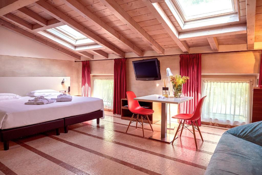 TV a/nebo společenská místnost v ubytování Hotel Veronesi La Torre