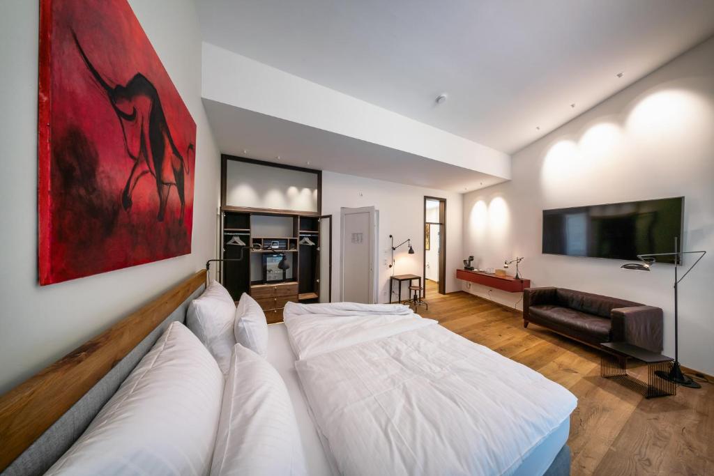 Postel nebo postele na pokoji v ubytování MotelplusHotel BiggeSeeFront