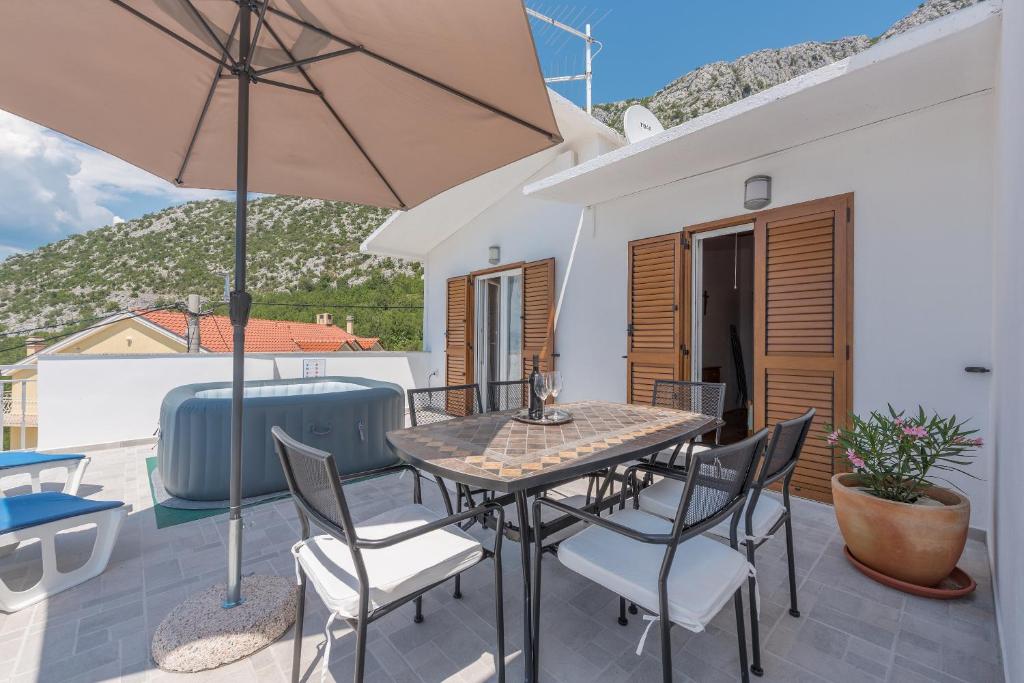 Balkón alebo terasa v ubytovaní Panoramico apartment, private jacuzzi