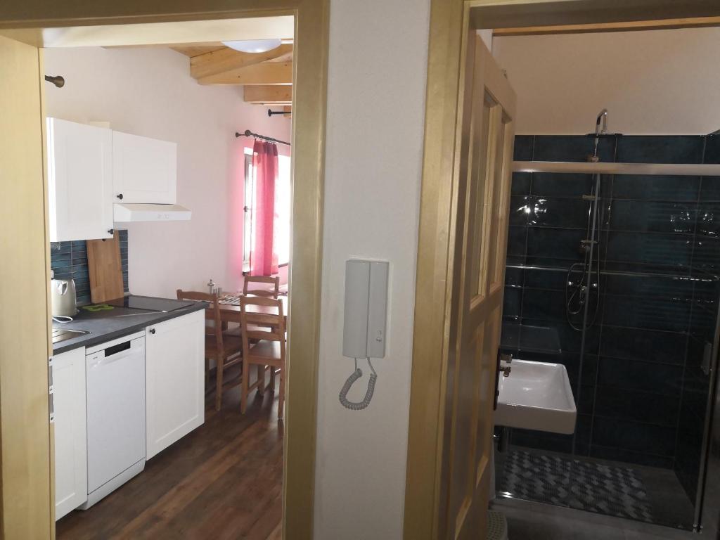 Kuchyň nebo kuchyňský kout v ubytování Apartmány Verunka