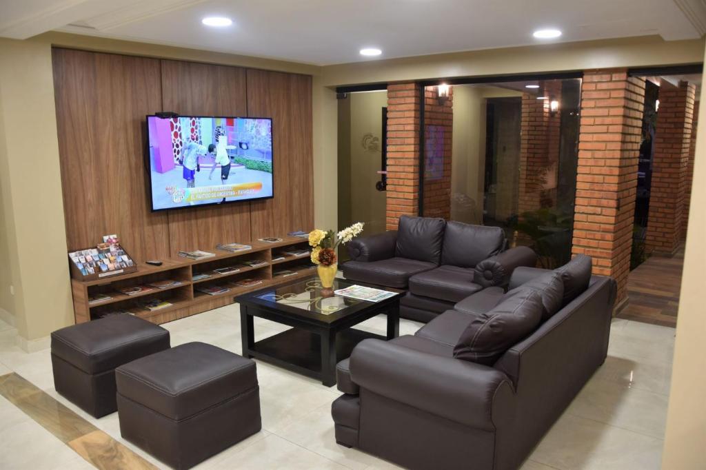 TV a/nebo společenská místnost v ubytování Posada del Cielo