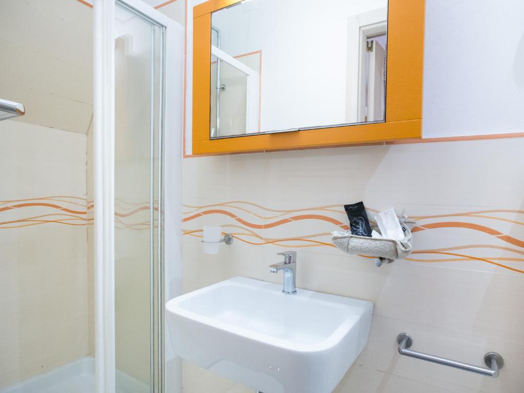 Koupelna v ubytování I Coralli rooms & apartments