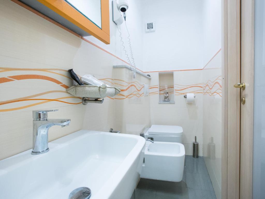 Koupelna v ubytování I Coralli rooms & apartments