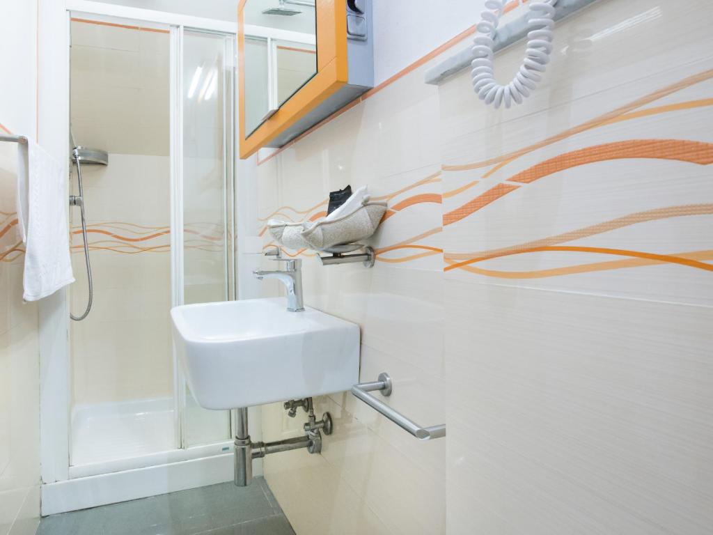 Koupelna v ubytování I Coralli rooms & apartments