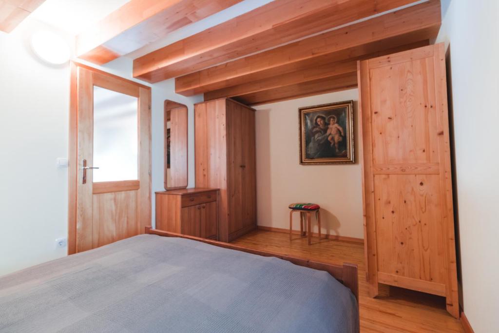 Postel nebo postele na pokoji v ubytování Apartments Pri Mari