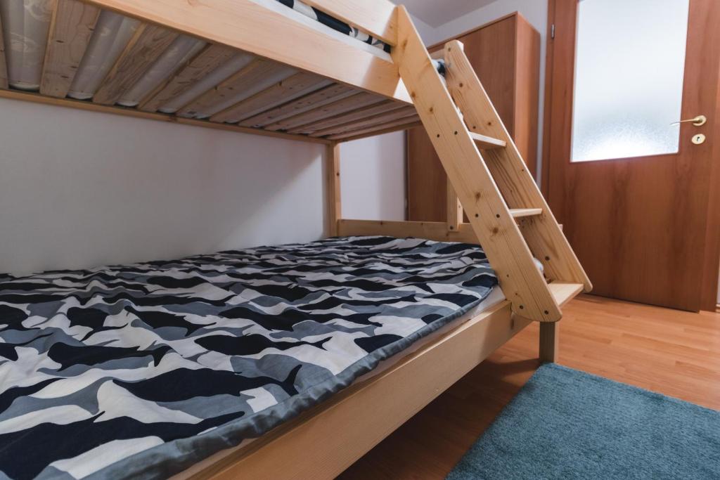 Postel nebo postele na pokoji v ubytování Apartments Pri Mari