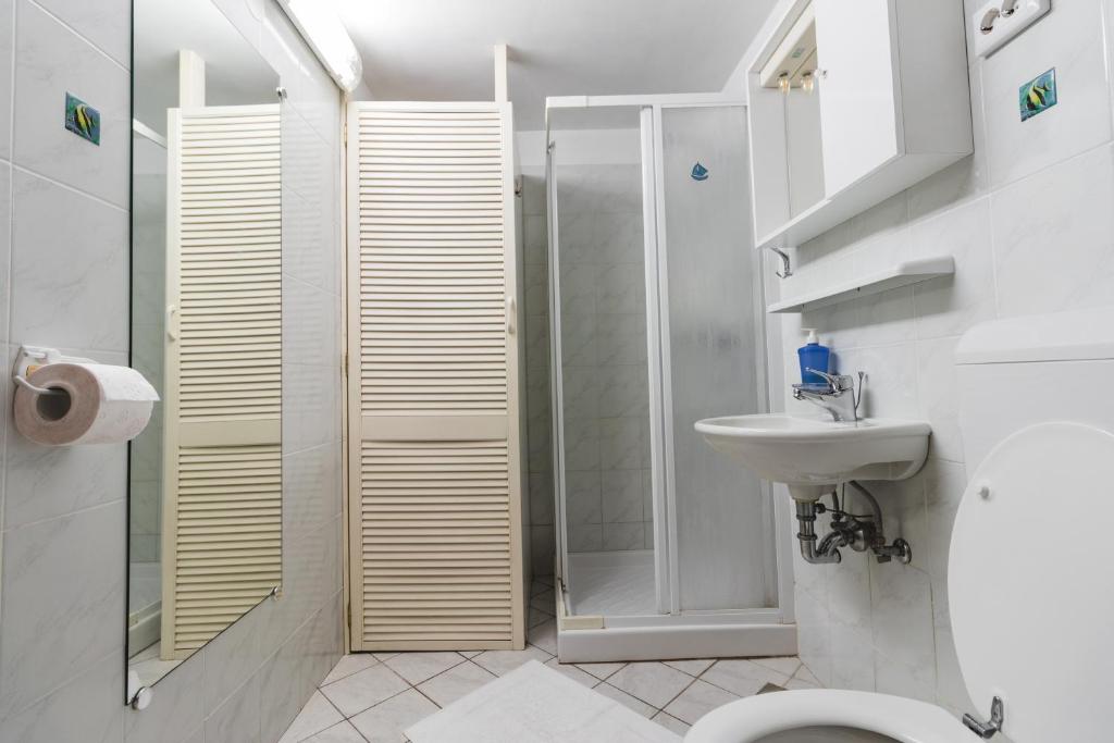 Koupelna v ubytování Apartments Pri Mari