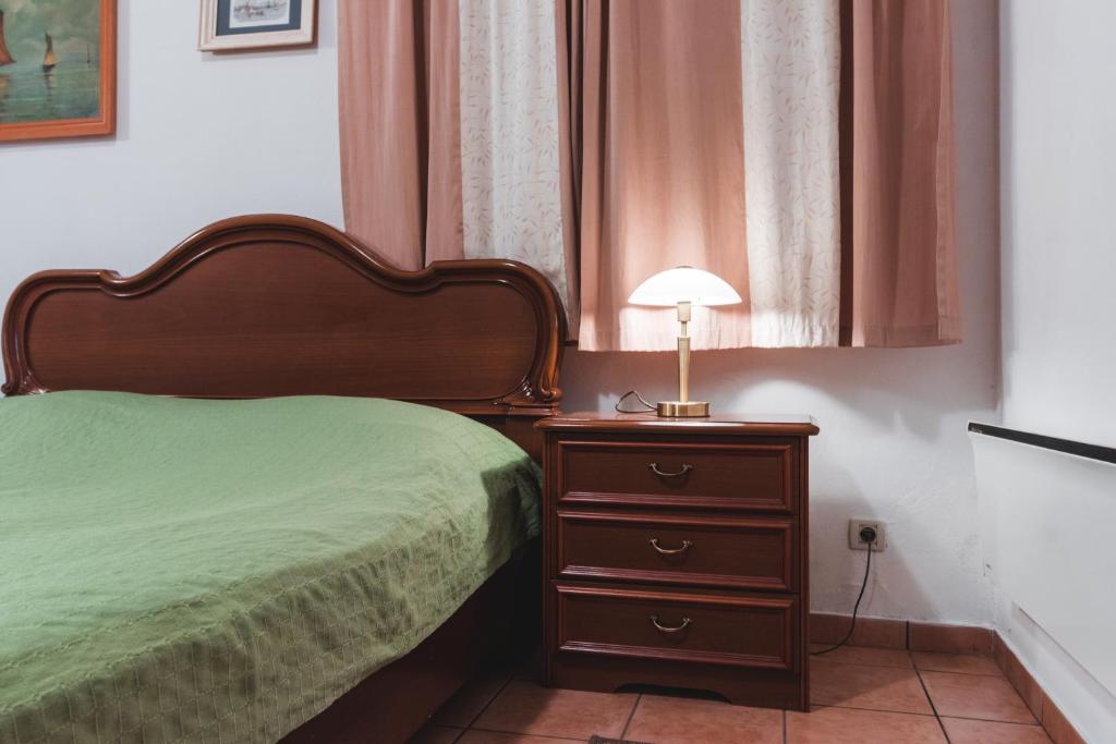 Postel nebo postele na pokoji v ubytování Apartments Pri Mari